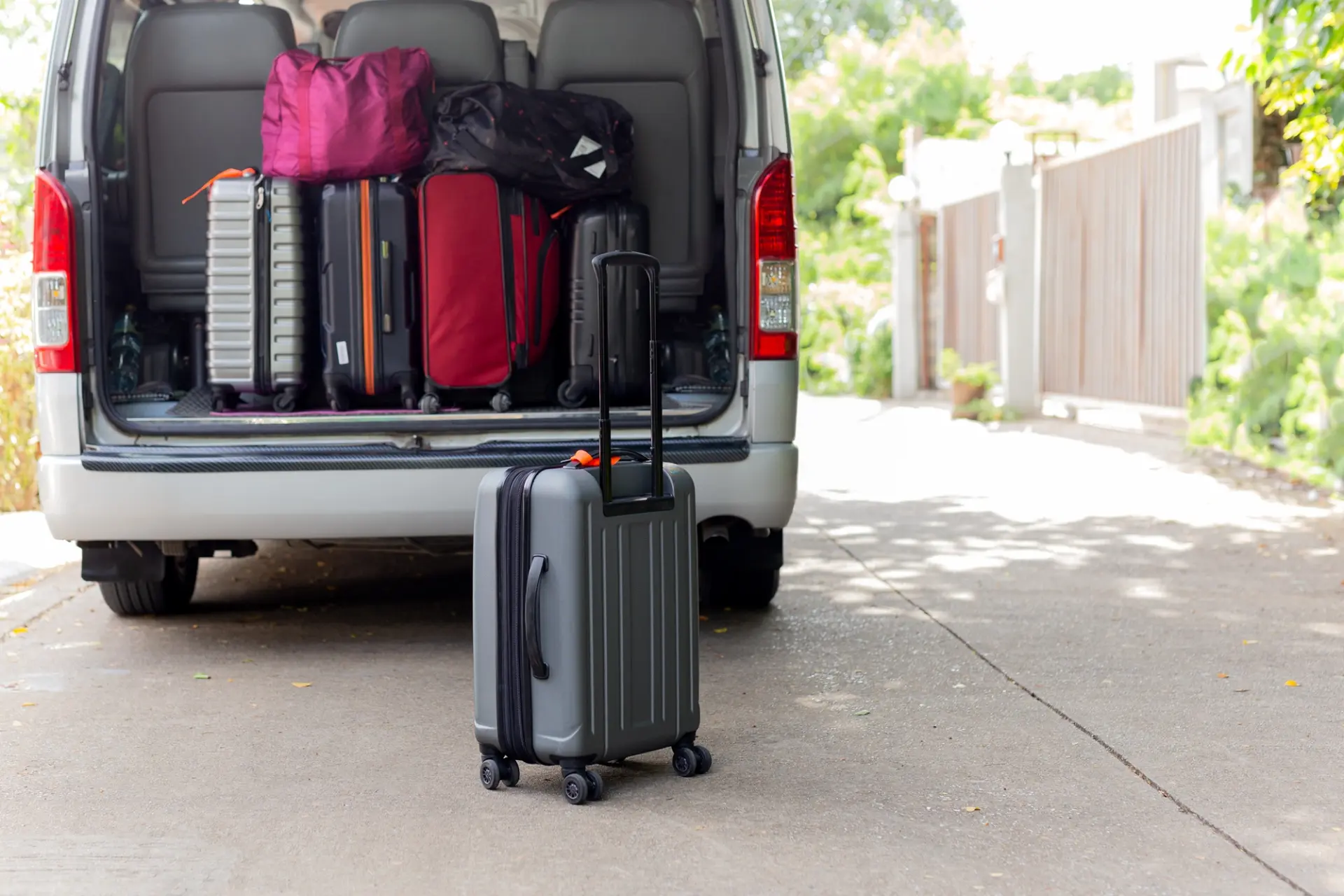 Carry-on luggage bag in mini bus travel concept